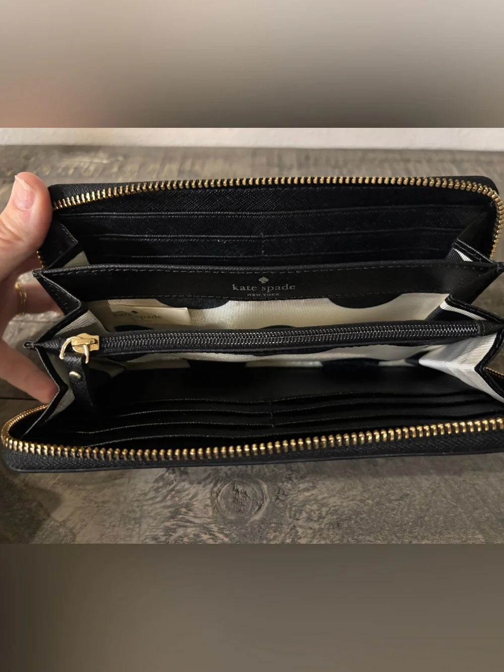 kate spade Black Zip Around Saffiano Wallet with Gold Logo